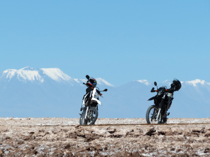 Motorcycle tour,  Atacama salt flat, Antofagasta region, Chile.